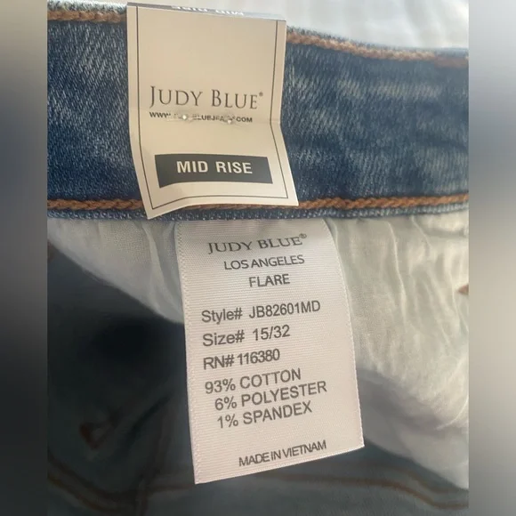 Judy Blue Mid Rise Medium Wash Peak-A-Boo Hem Slit Flare Jeans - Picture 12 of 12
